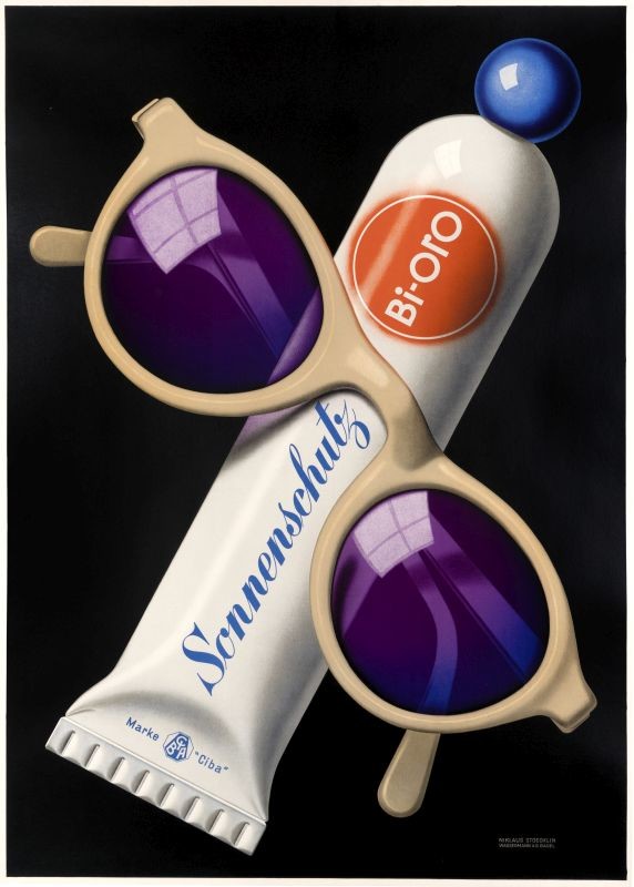 Close-up view of sunglasses and sun tan lotion tube; purple, orange, black