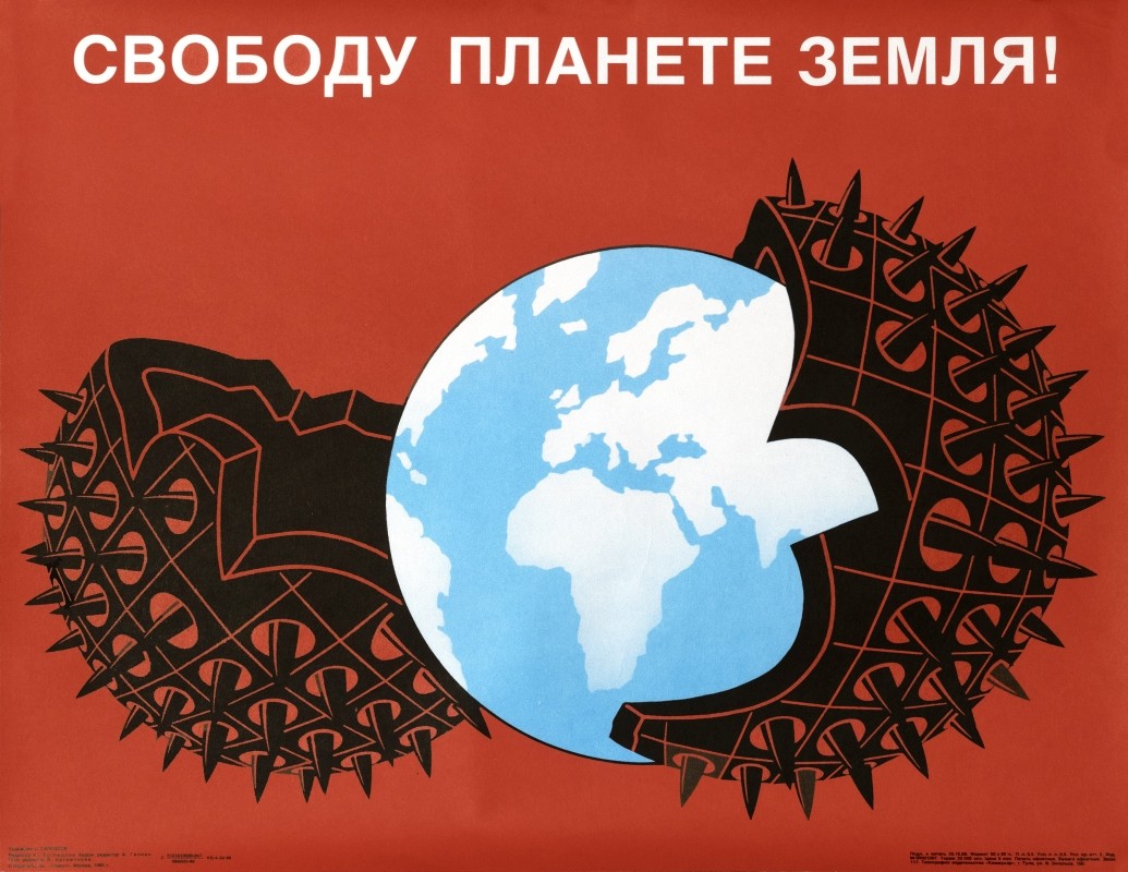 globe inside thorny metal nutshell; black, red, blue, white