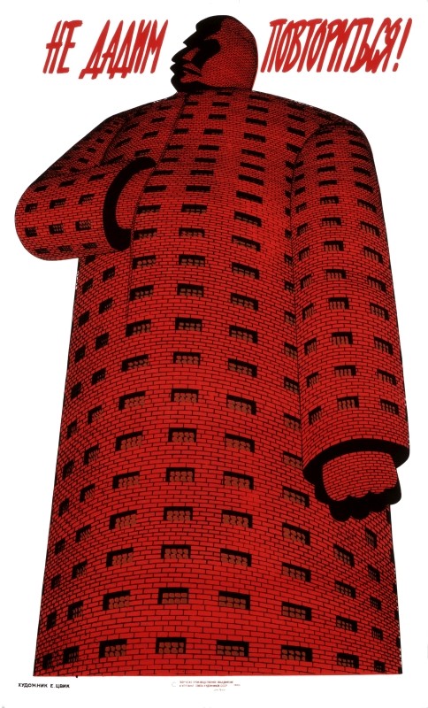 Tall brick prison with windows in form of Stalin; red, white, black